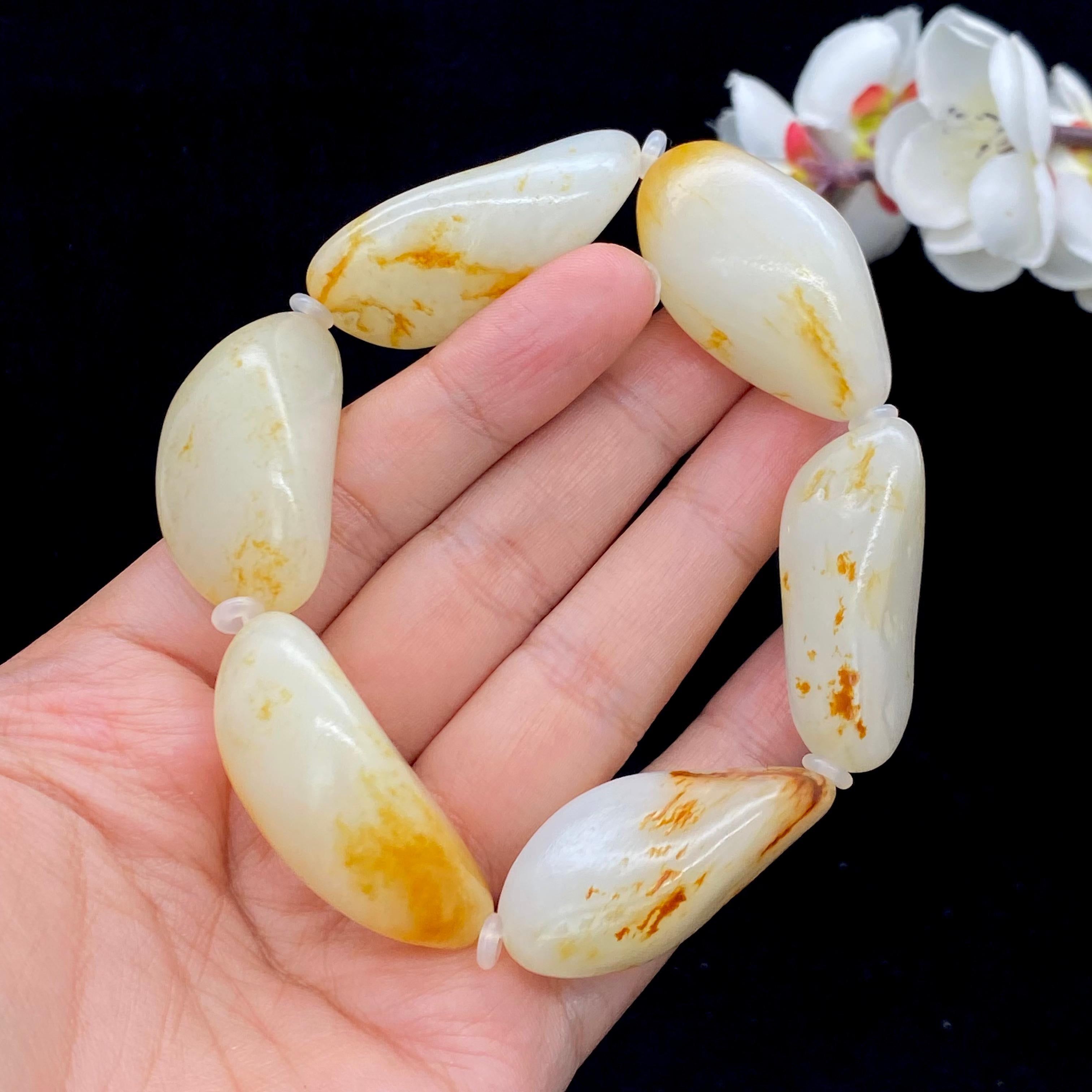 和田玉洒红皮籽料【精品手串】（109.7g）