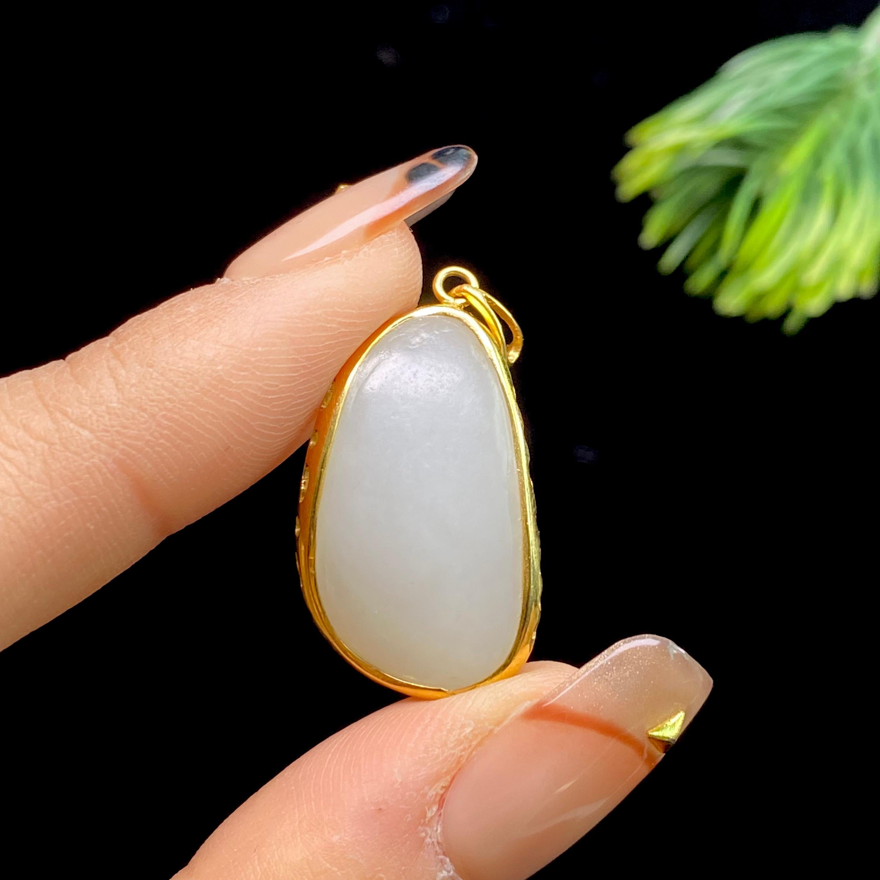 和田玉18k镶金籽料吊坠（5.2g）