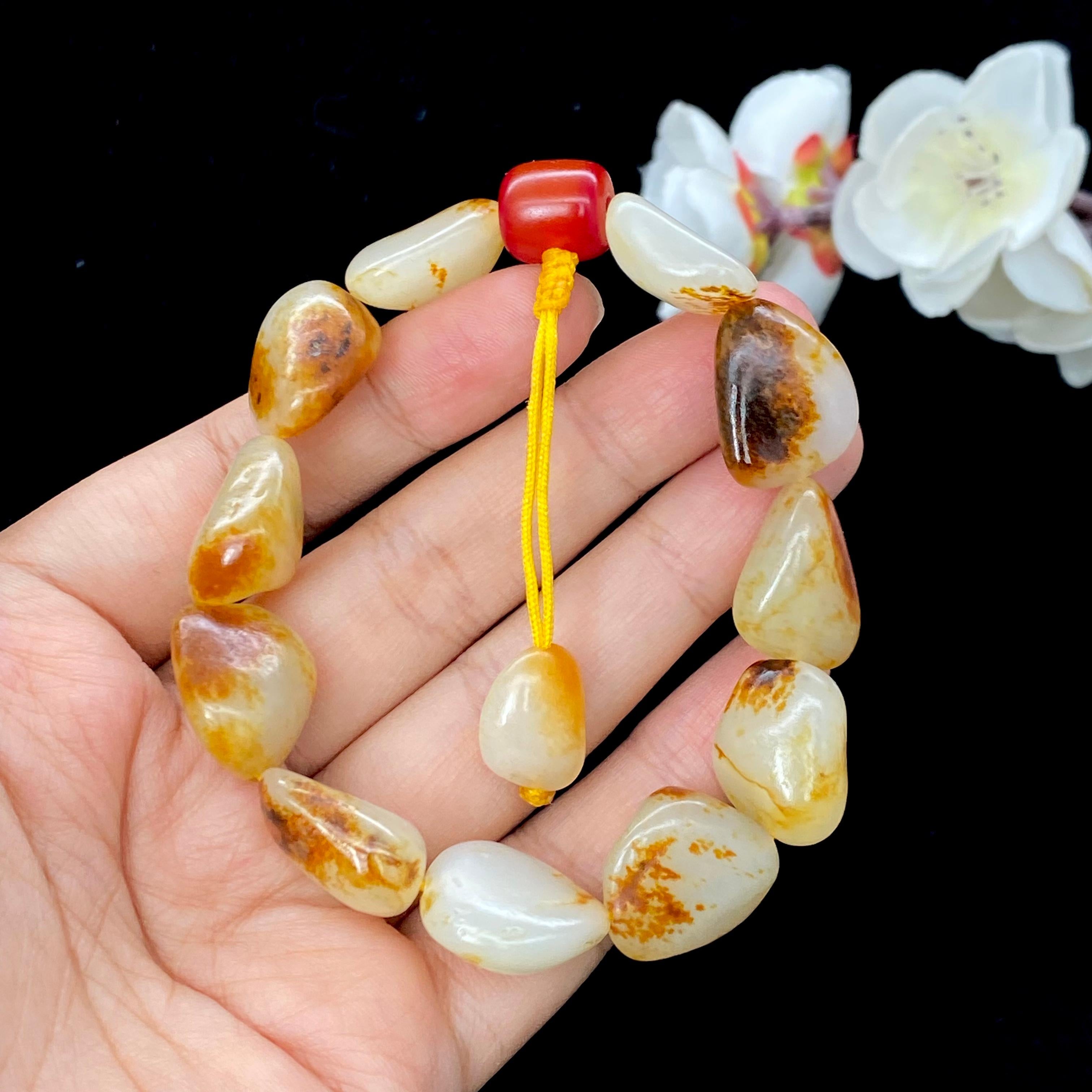 和田玉洒红皮籽料【精品手串】（46.8g）