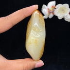 和田玉黄皮籽料手把件（135.3g）