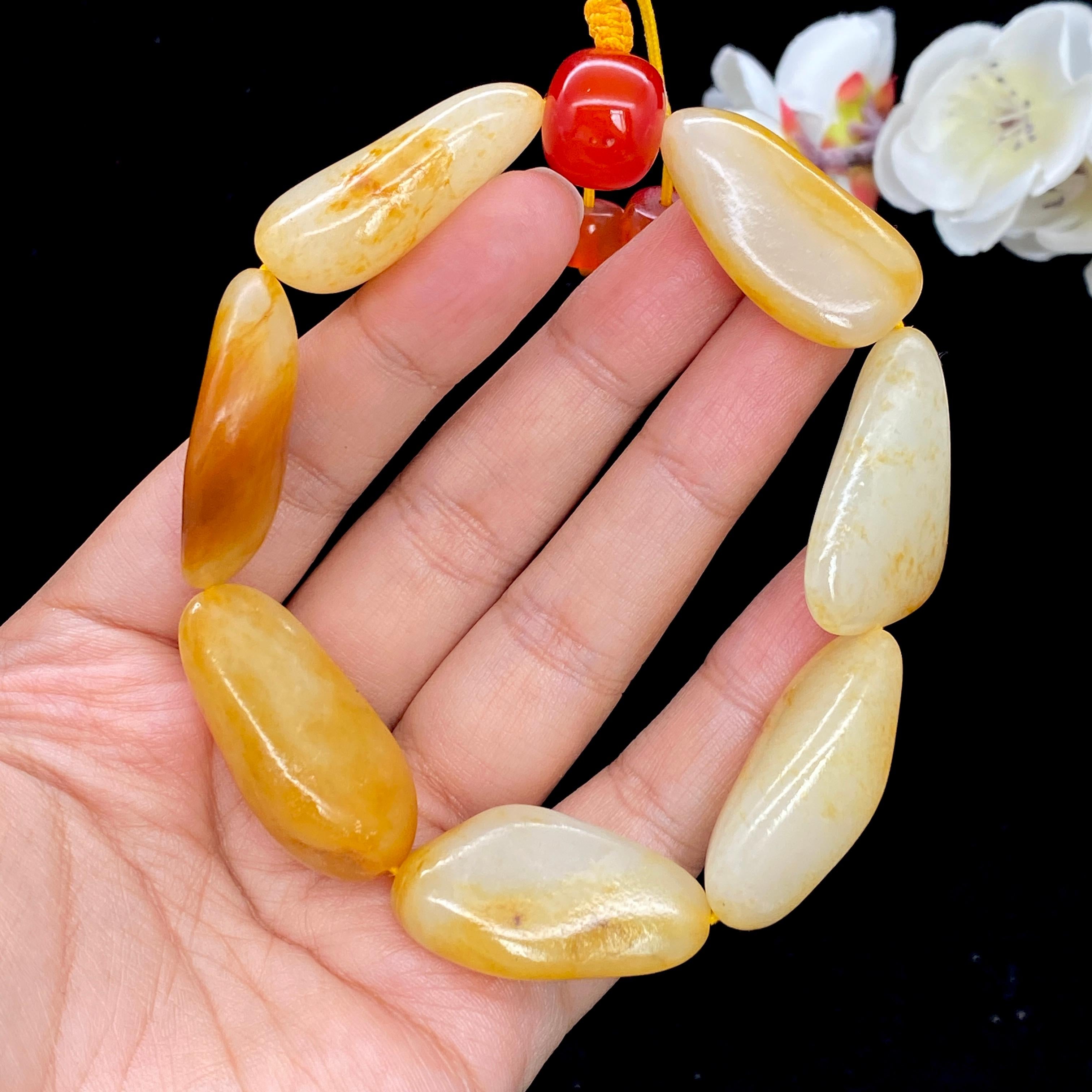 和田玉聚黄皮籽料【精品手串】（78.5g）