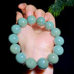 和田玉籽料沙枣青圆珠手串（89.9g）