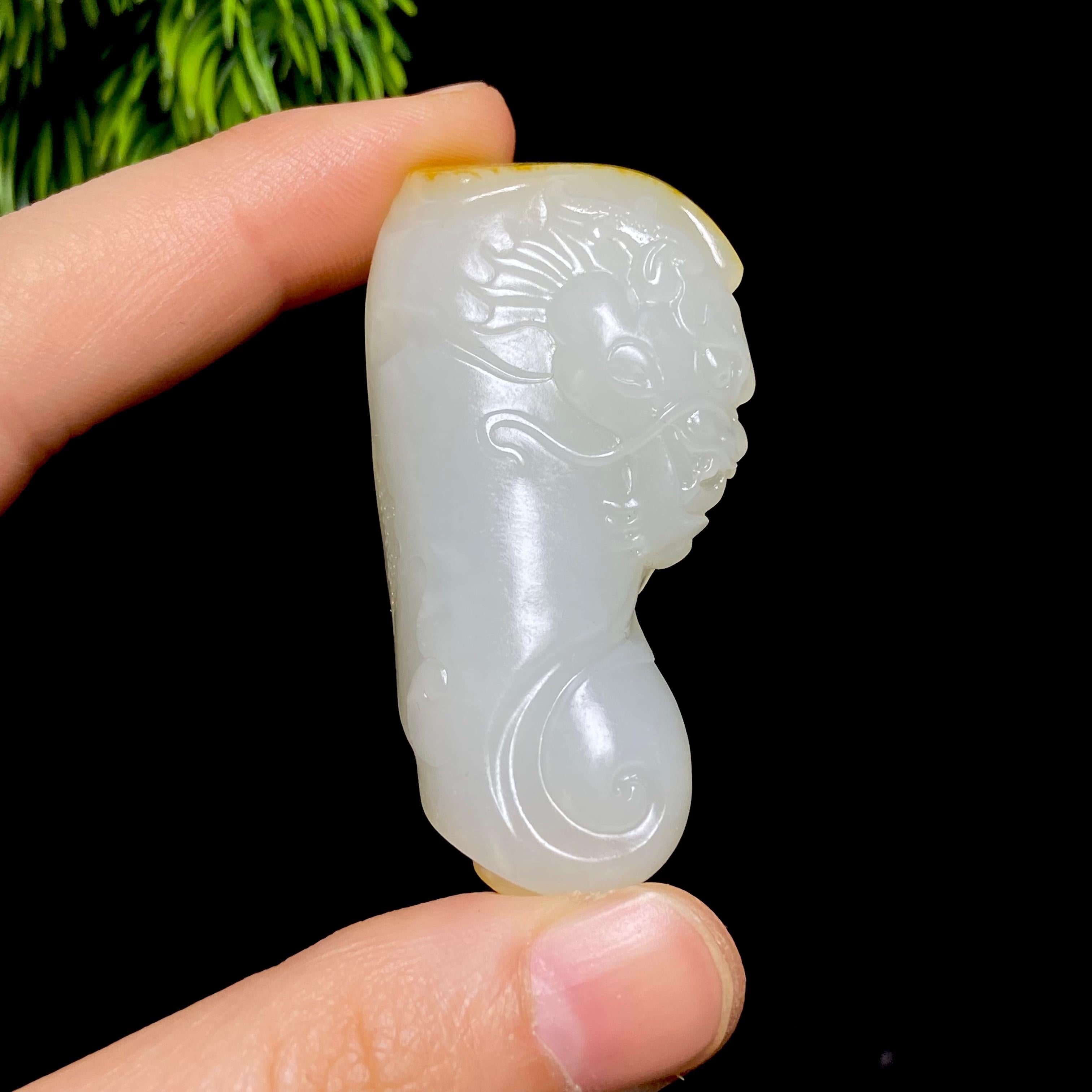 秒杀和田玉籽料龙行天下（33.7g）