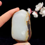 和田玉聚红皮籽料手把件（91.3g）