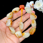 和田玉聚黄皮籽料【精品手串】（62.3g）