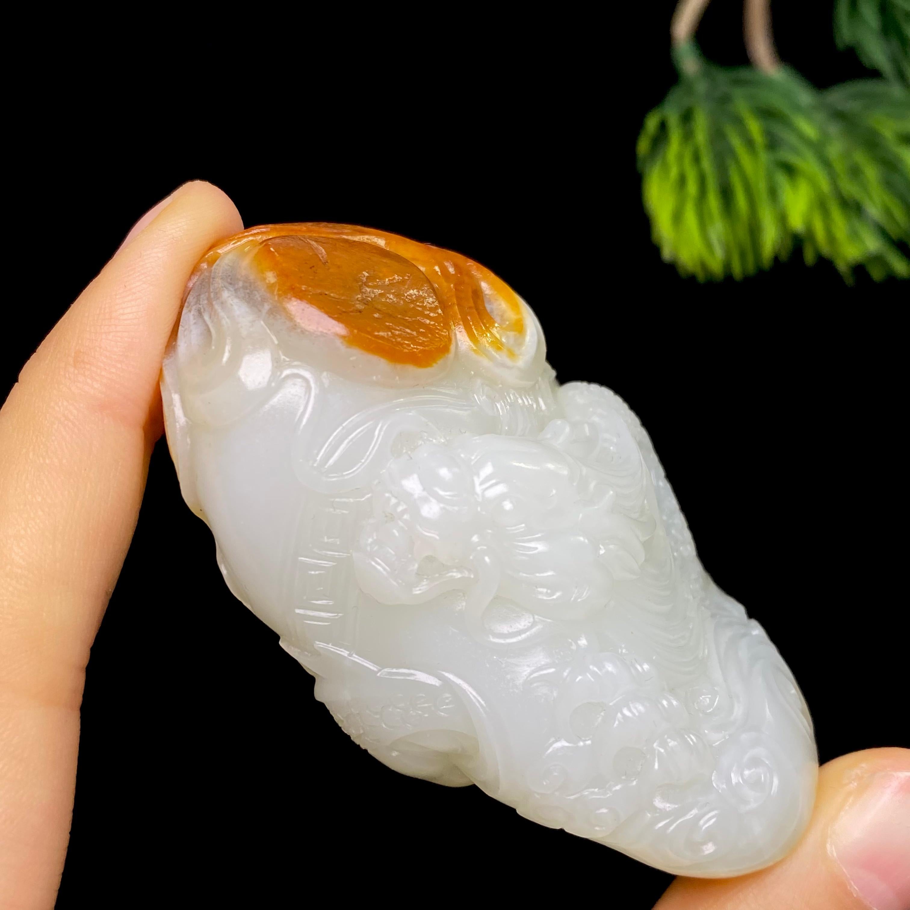 和田玉籽料龙行天下（100.6g）