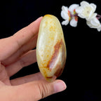 和田玉洒红皮青花底籽料原石（207.2g）