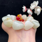 和田玉白玉带洒金皮籽料【精品手串】（83.8g）