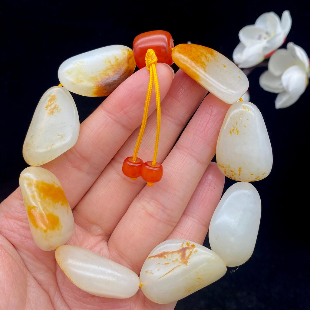 和田玉洒红皮籽料【精品手串】（75.9g）