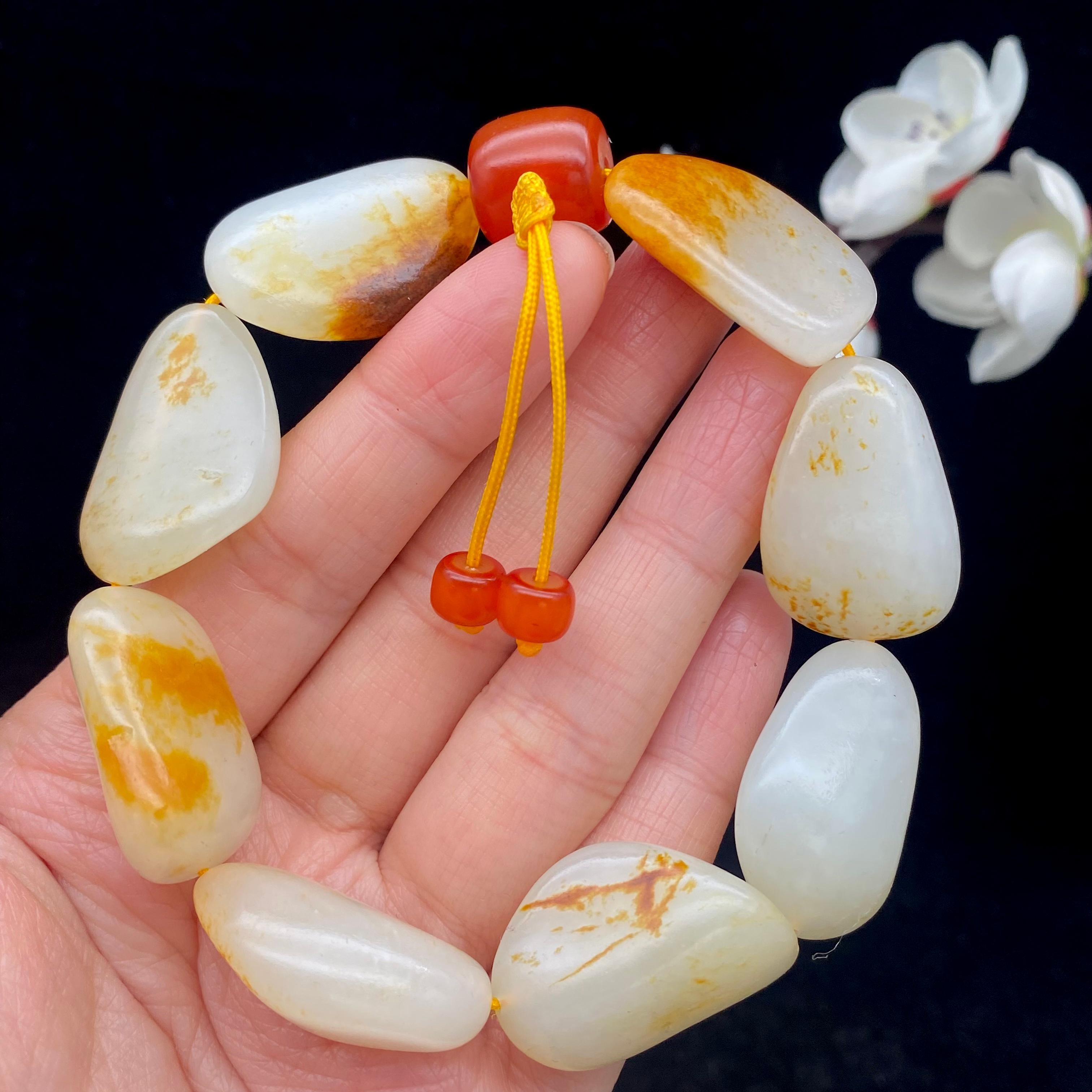 和田玉洒红皮籽料【精品手串】（75.9g）