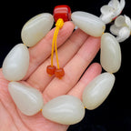 和田玉白玉带洒金皮【精品手串】（92.6g）