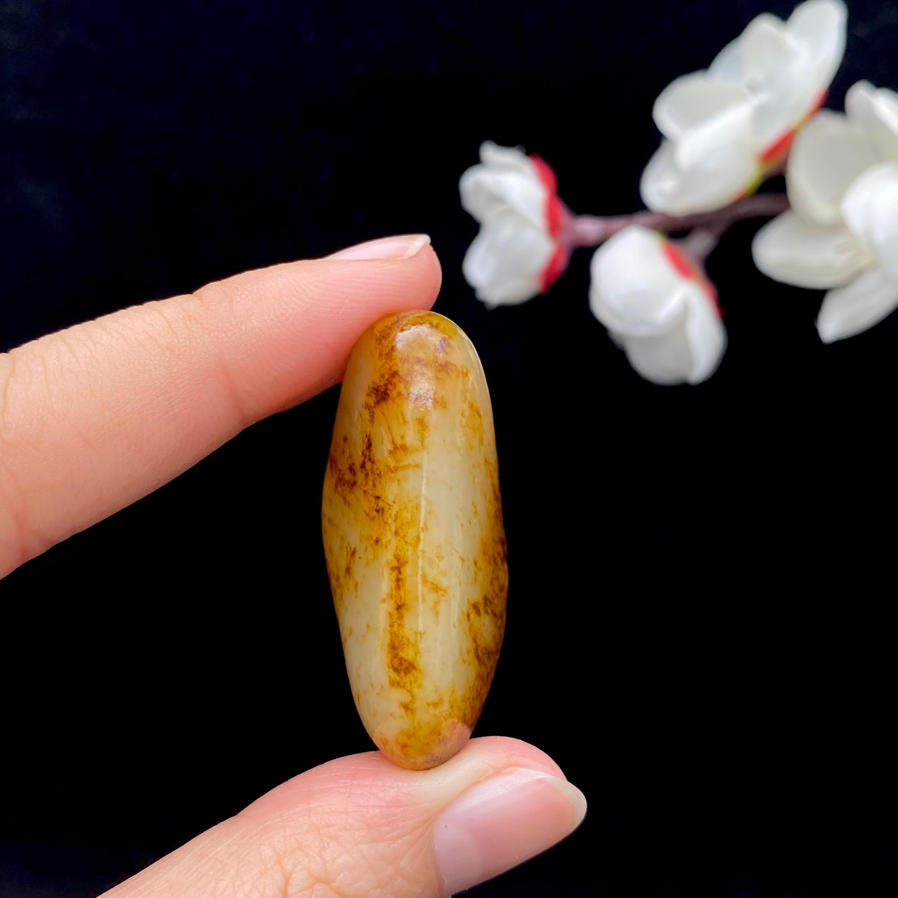 和田玉洒红皮籽料原石（23.2g）