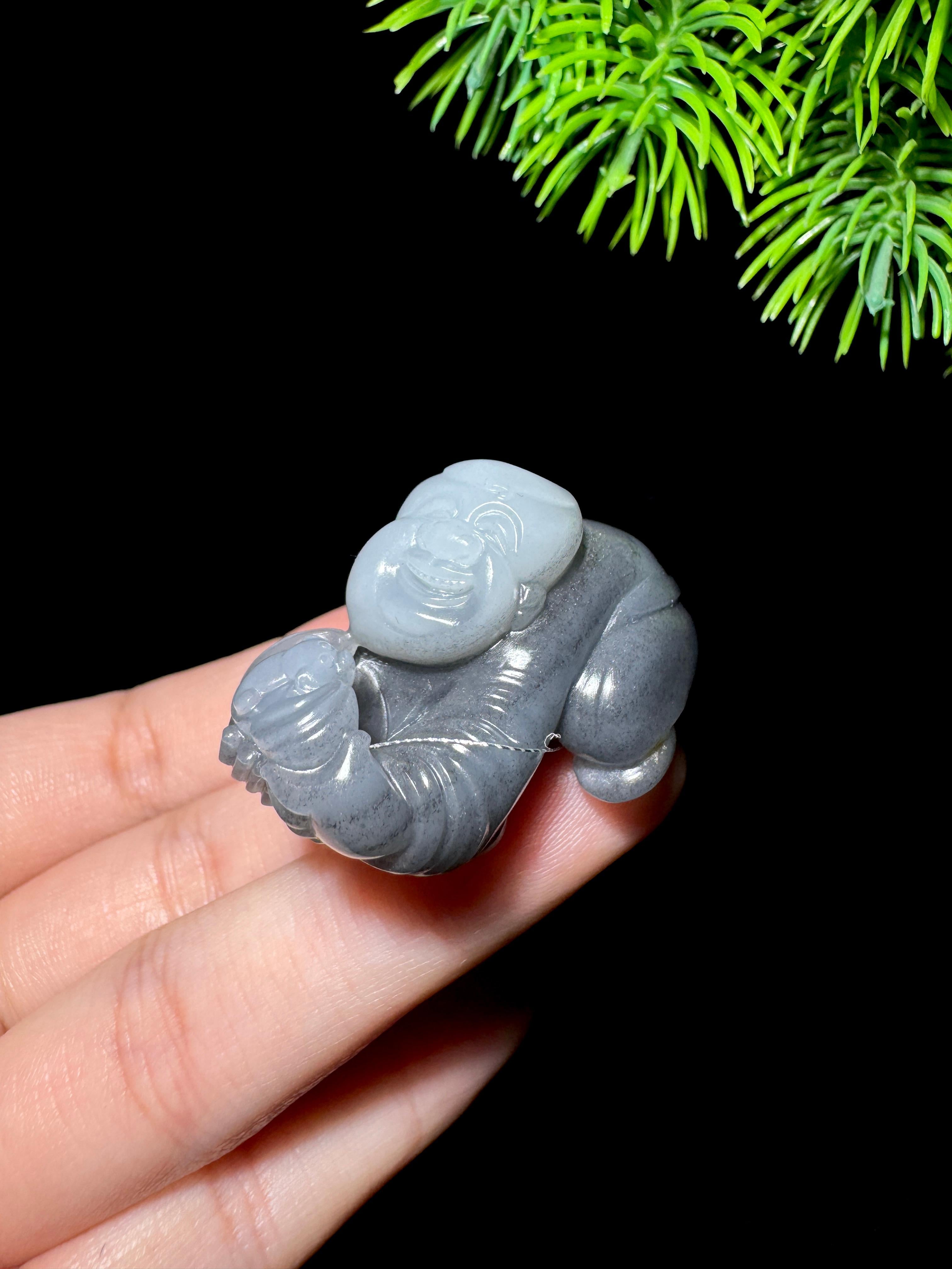 和田玉籽料青花送财童子（27.7g）