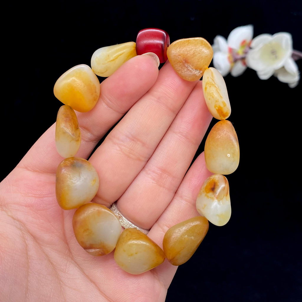 和田玉聚黄皮籽料【精品手串】（45.8g）