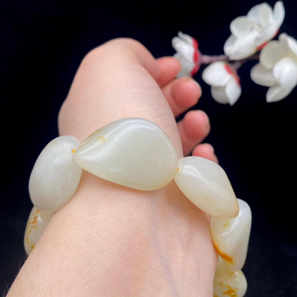 和田玉洒红皮籽料【精品手串】（75.9g）