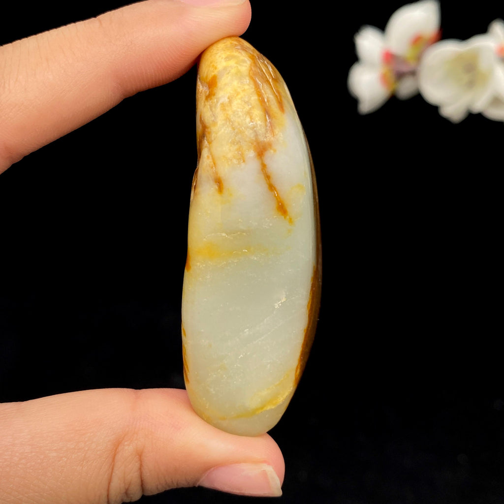 和田玉聚黄皮籽料手把件（67.5g）