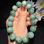 特色和田玉籽料沙枣青圆珠手串（69.1g）