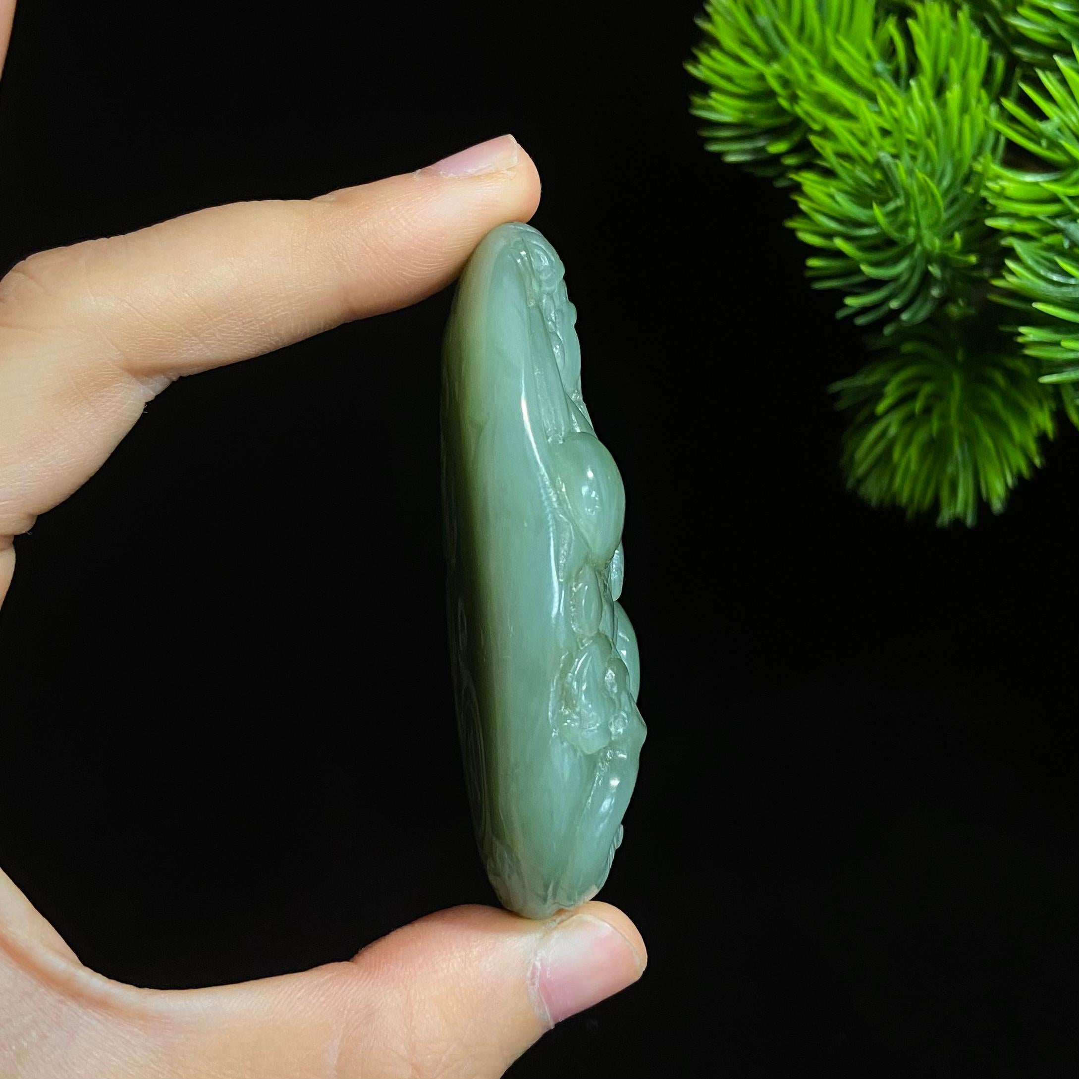 和田碧玉猫眼财神大手把件（77.0g）