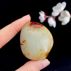 和田玉聚红皮籽料原石（64.3g）