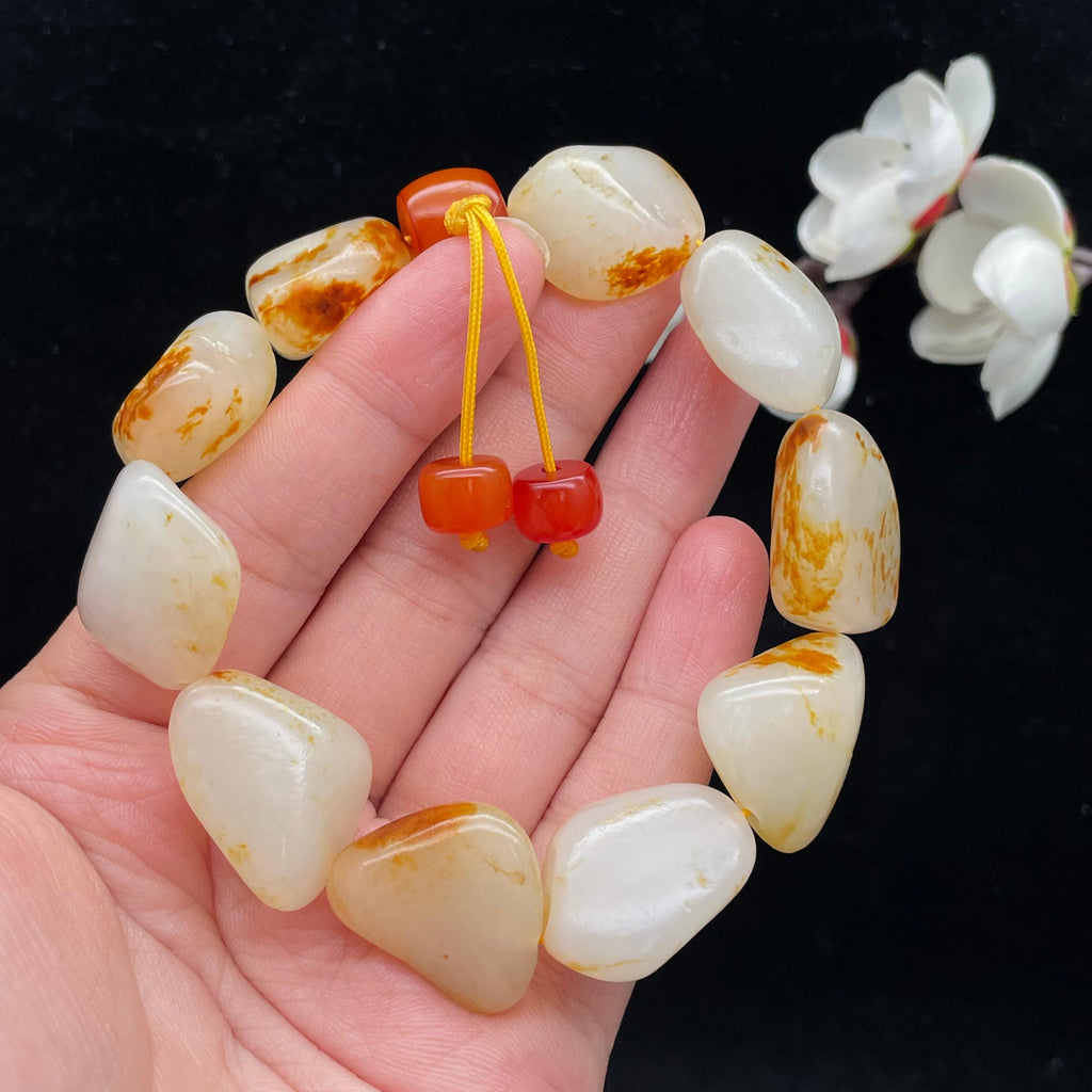 和田玉洒红皮籽料【精品手串】（64.1g）