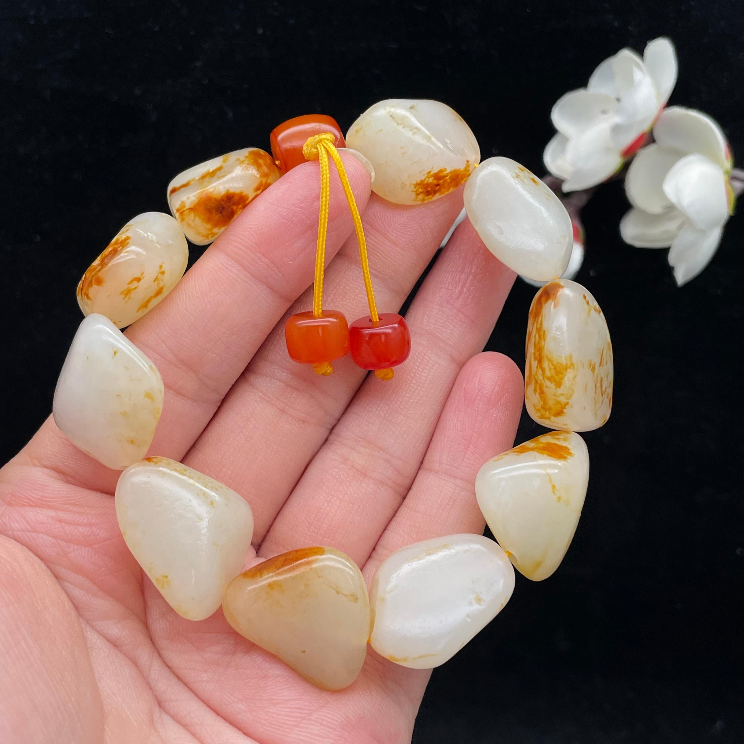 和田玉洒红皮籽料【精品手串】（64.1g）