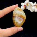 和田玉聚红皮籽料小手把件（75.3g）