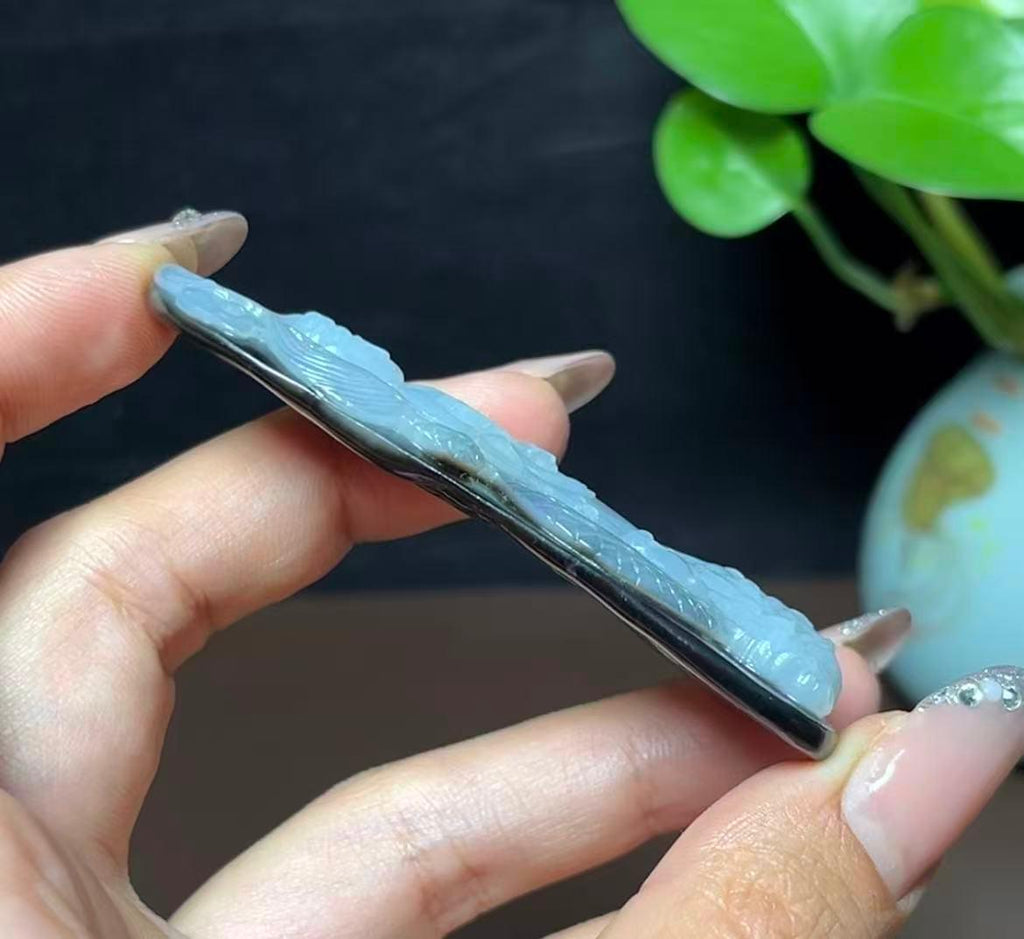 和田玉籽料黑皮白肉羊脂玉御龙观音（28.0g）