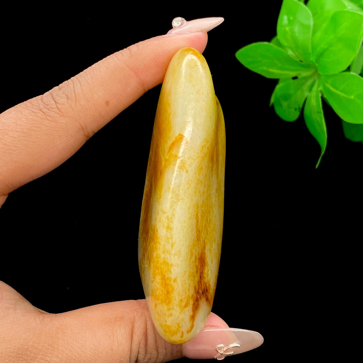 和田玉聚黄皮籽料手把件（149.4g）
