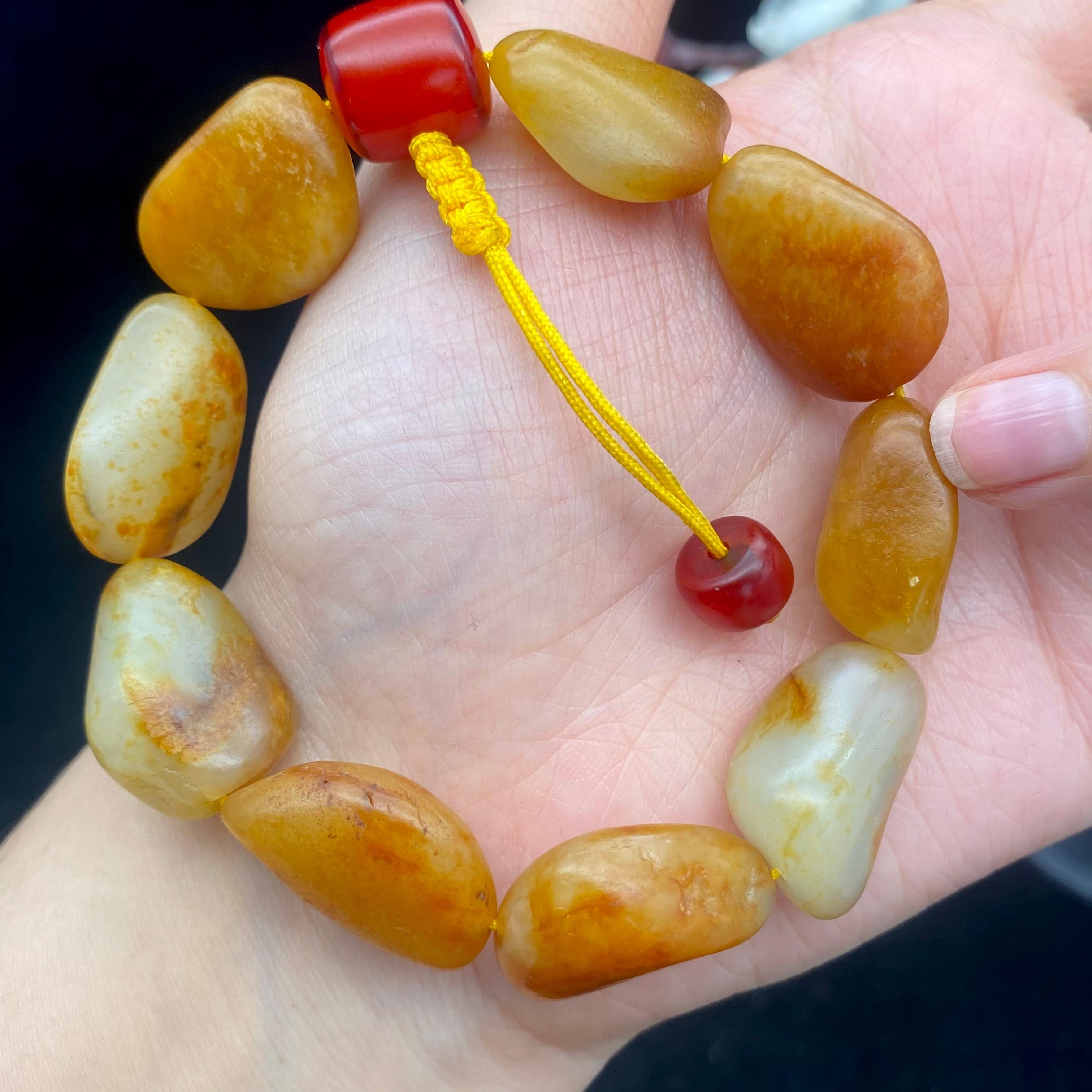 和田玉聚黄皮籽料【精品手串】（49.4g）