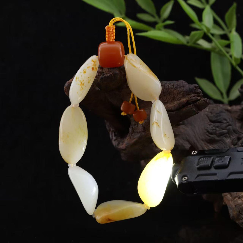 和田玉洒金皮籽料【精品手串】（62.5g）