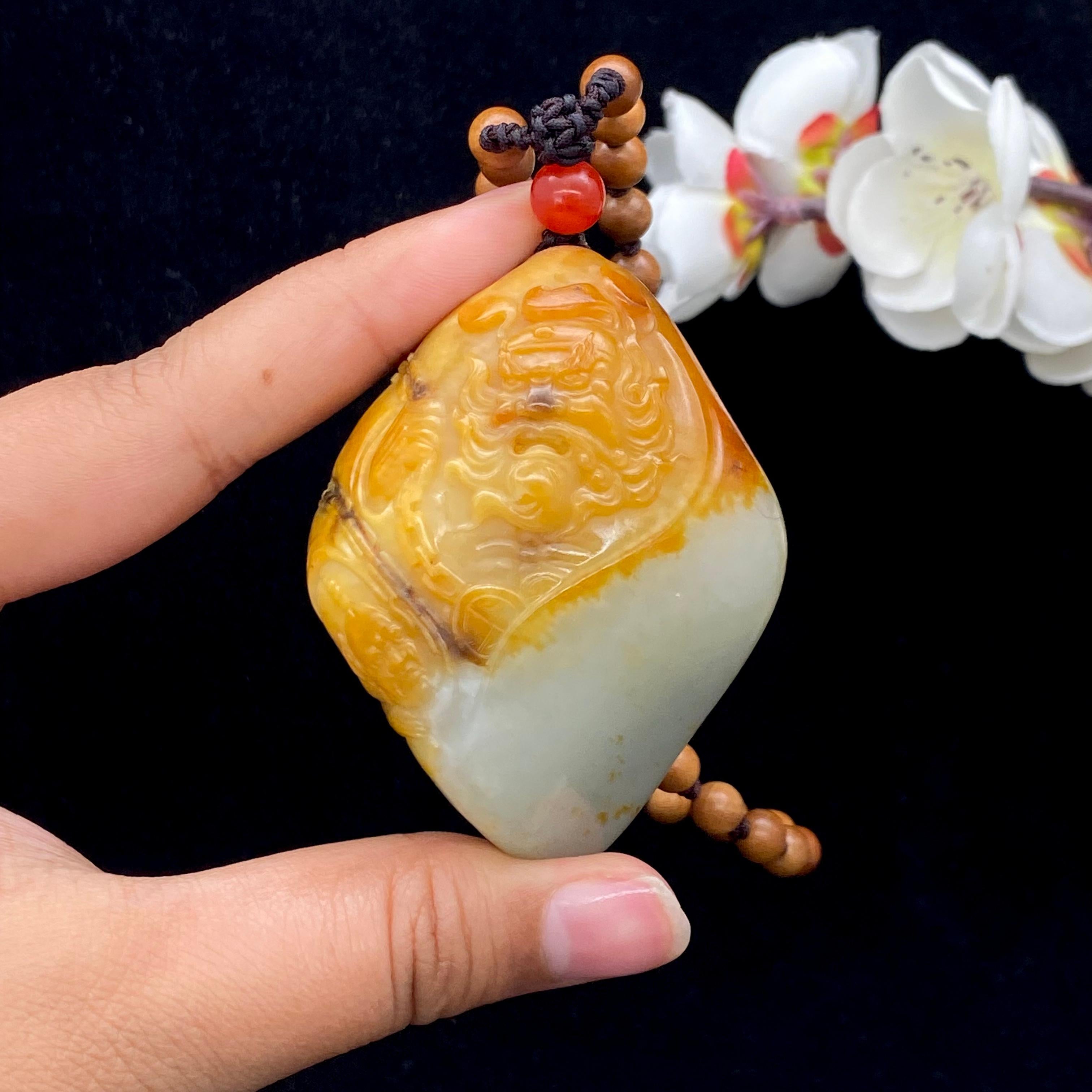 和田玉籽料【钟馗】手把件（123.7g）