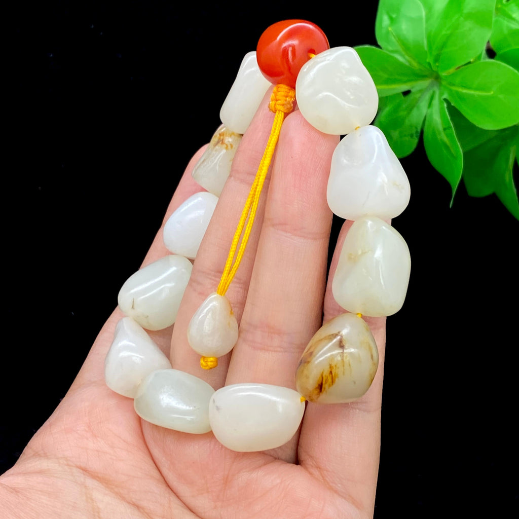 和田玉黄皮籽料【精品手串】（65.8g）