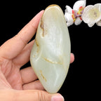 和田玉青白玉带黄皮籽料手把件（210.3g）