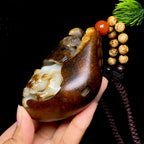 和田玉-红沁皮豹子籽料把件（310.8g）