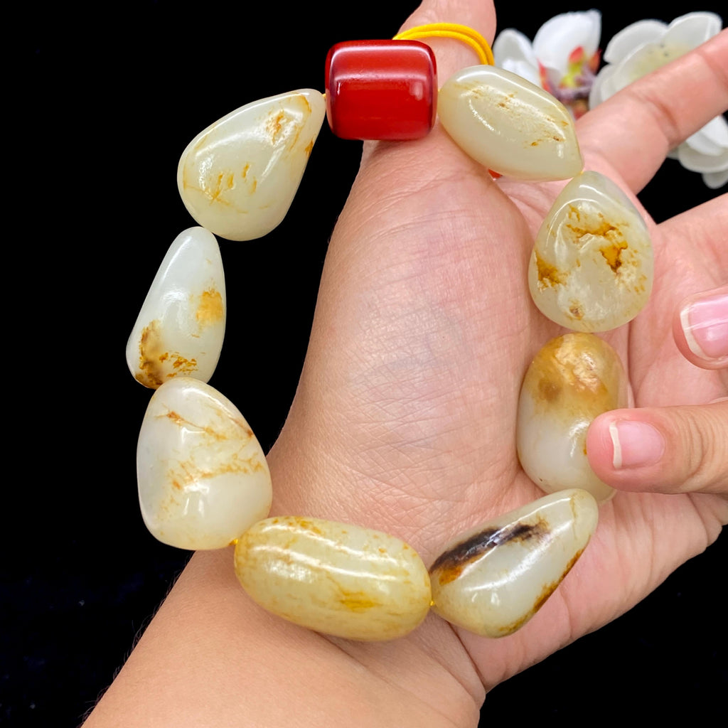 和田玉洒金皮籽料【精品手串】（137.8g）