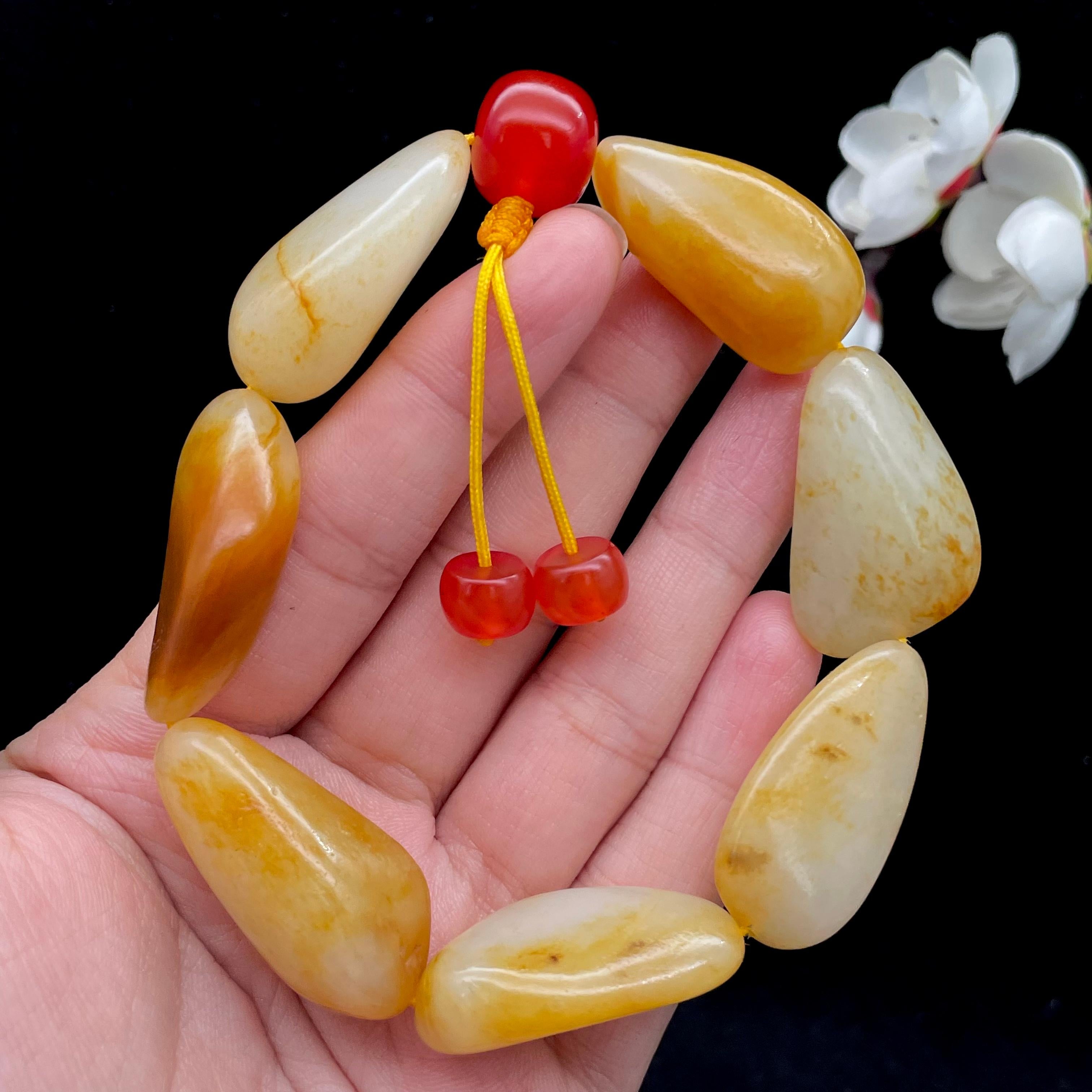 和田玉聚黄皮籽料【精品手串】（78.7g）