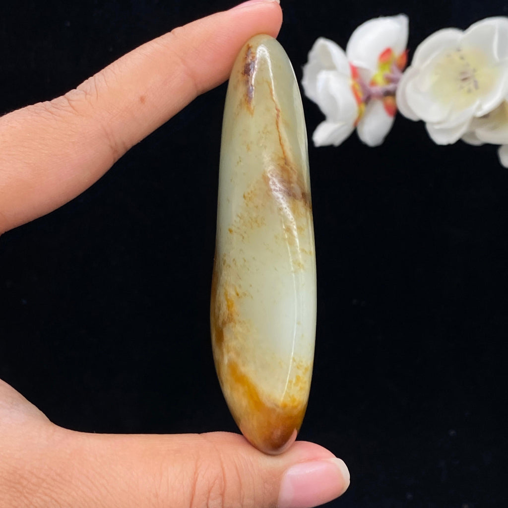 和田玉聚黄皮籽料手把件（115g）