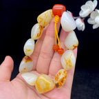 和田玉洒红皮籽料【精品手串】（71.4g）