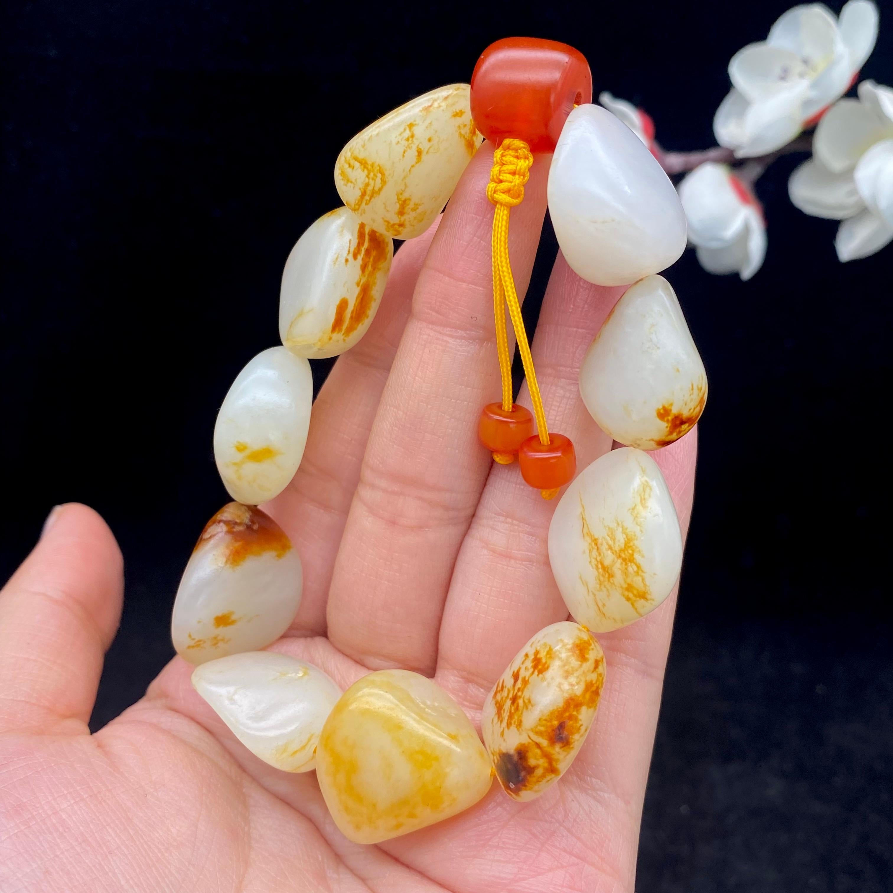和田玉洒红皮籽料【精品手串】（71.4g）