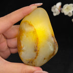 和田玉聚黄皮籽料手把件（144.8g）
