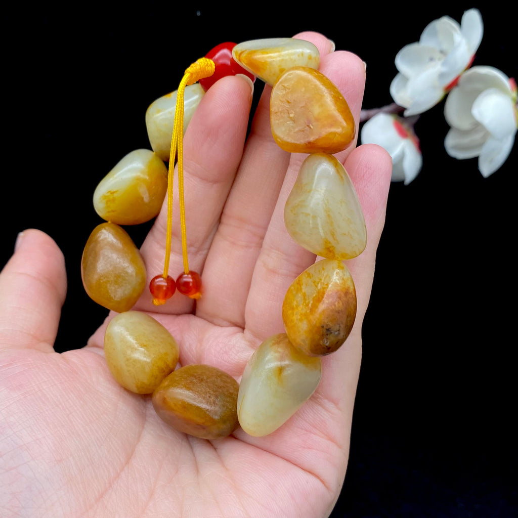 和田玉聚黄皮籽料【精品手串】（71.4g）