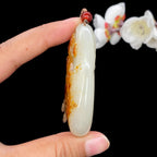 和田玉红皮籽料【坐莲观音】（65.1g）