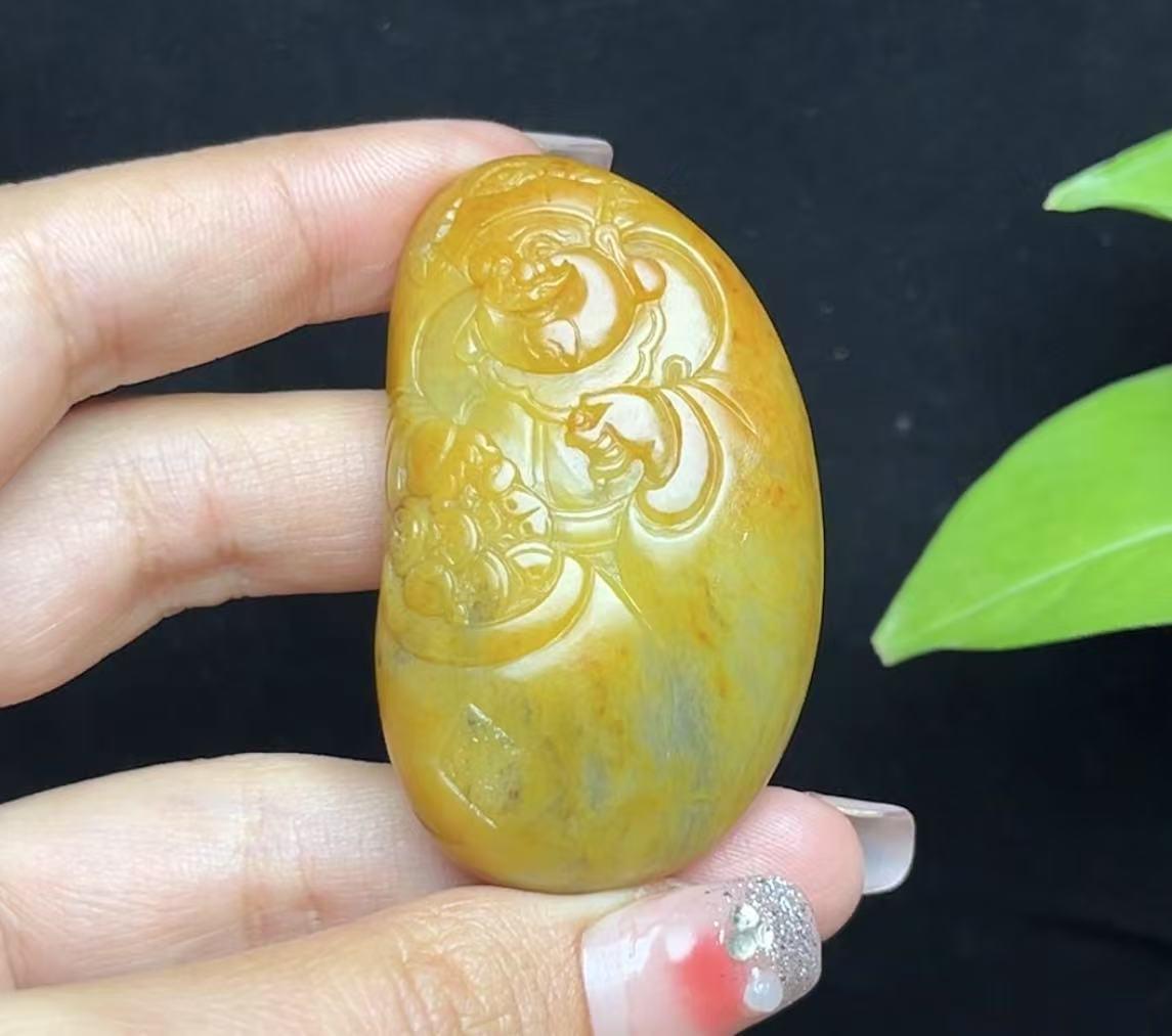 新疆和田玉籽料红沁财神（53.3g）