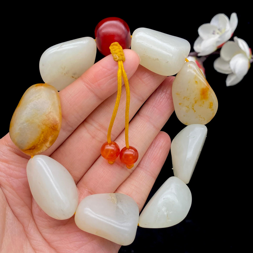 和田玉洒金皮籽料【精品手串】（90.8g）