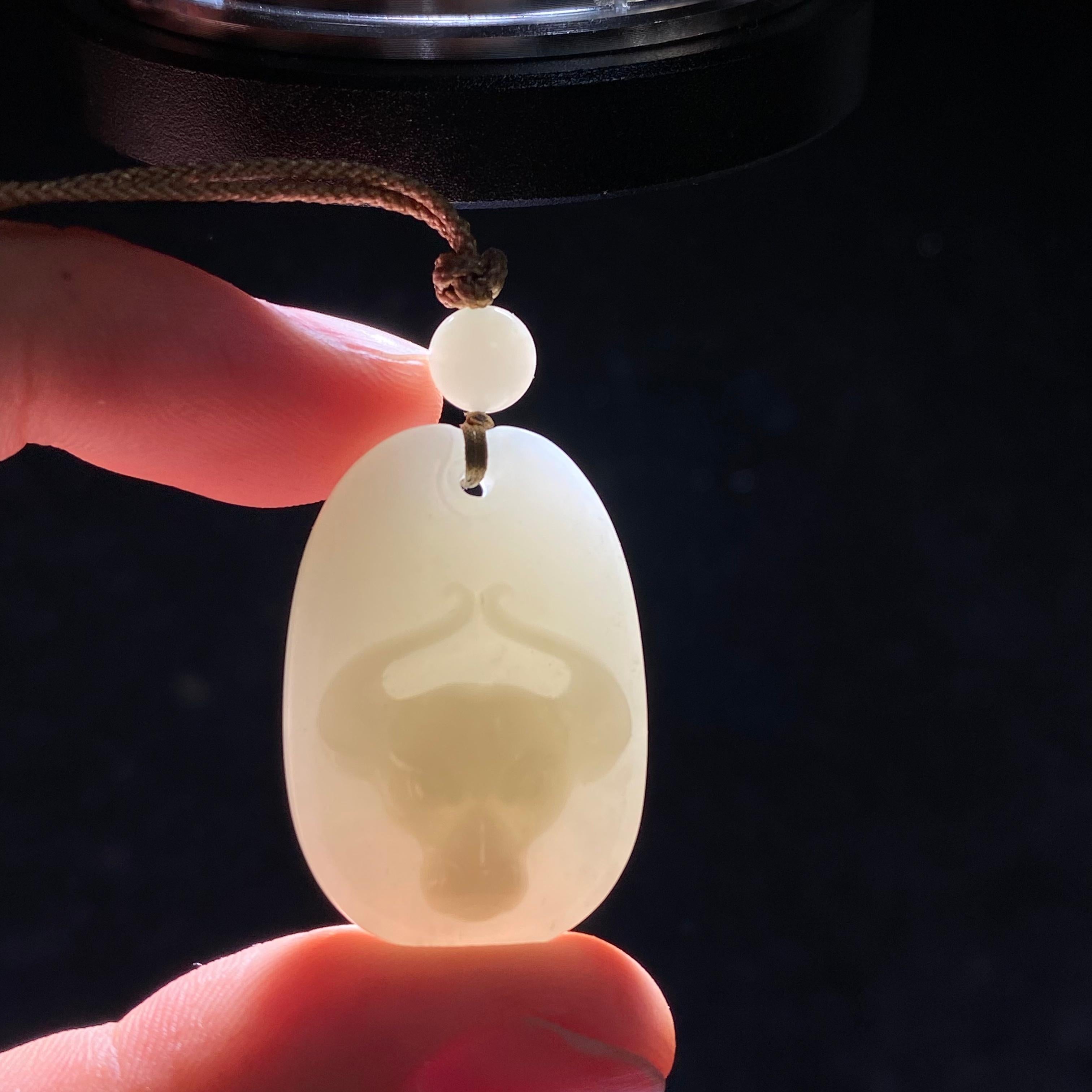 和田玉新疆且末米达料白玉生肖牛（9.6g）