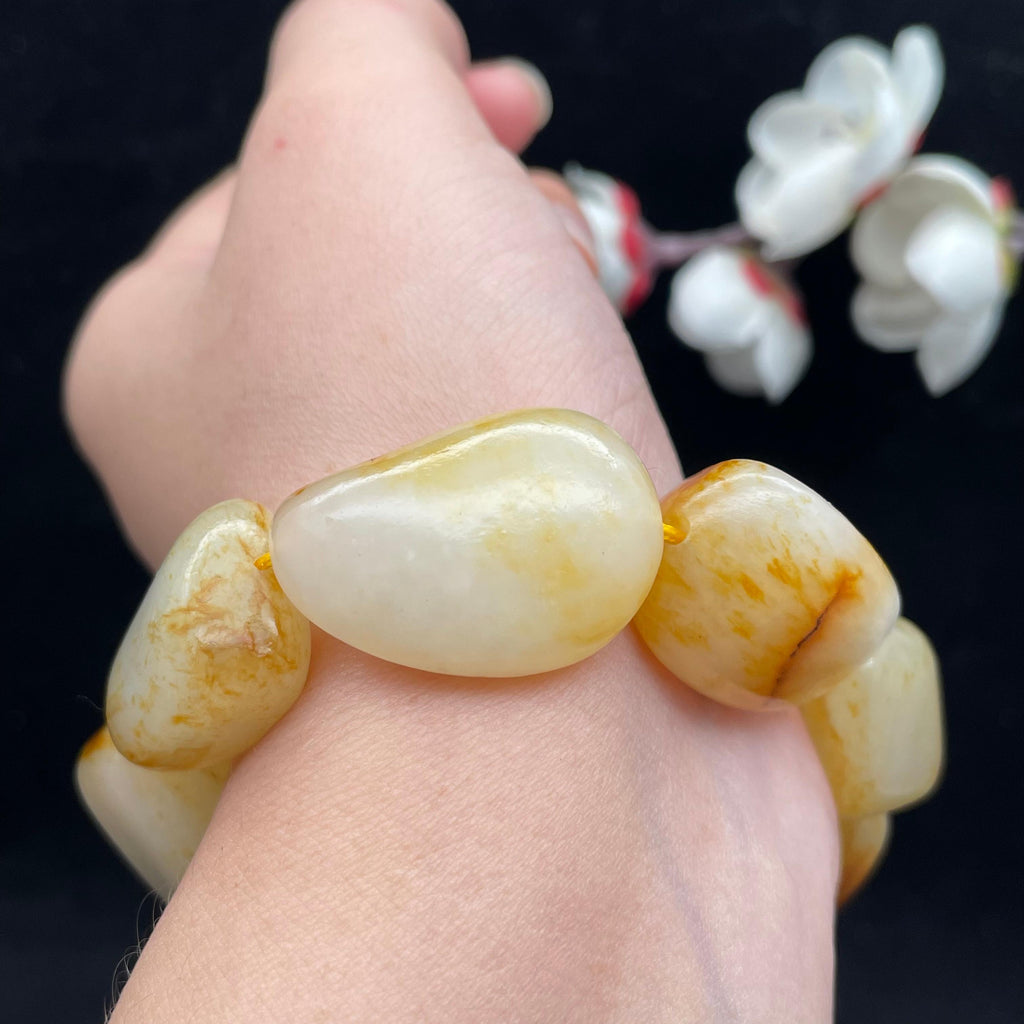 和田玉洒金皮籽料【精品手串】（86.8g）