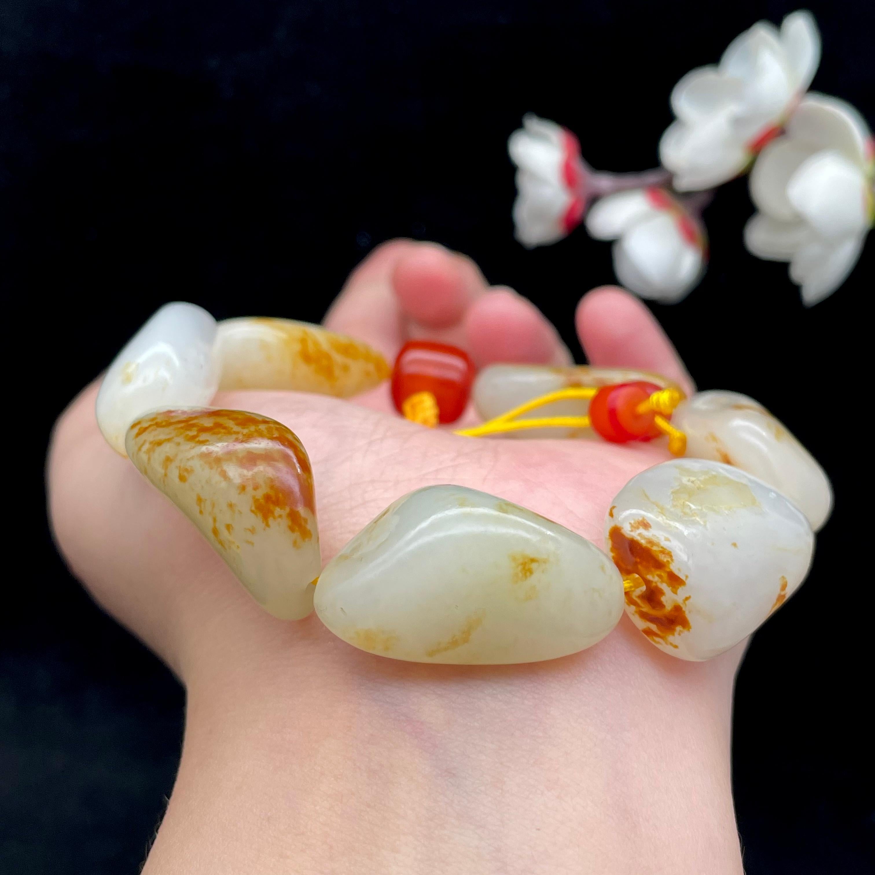 和田玉洒红皮籽料【精品手串】（72.4g）