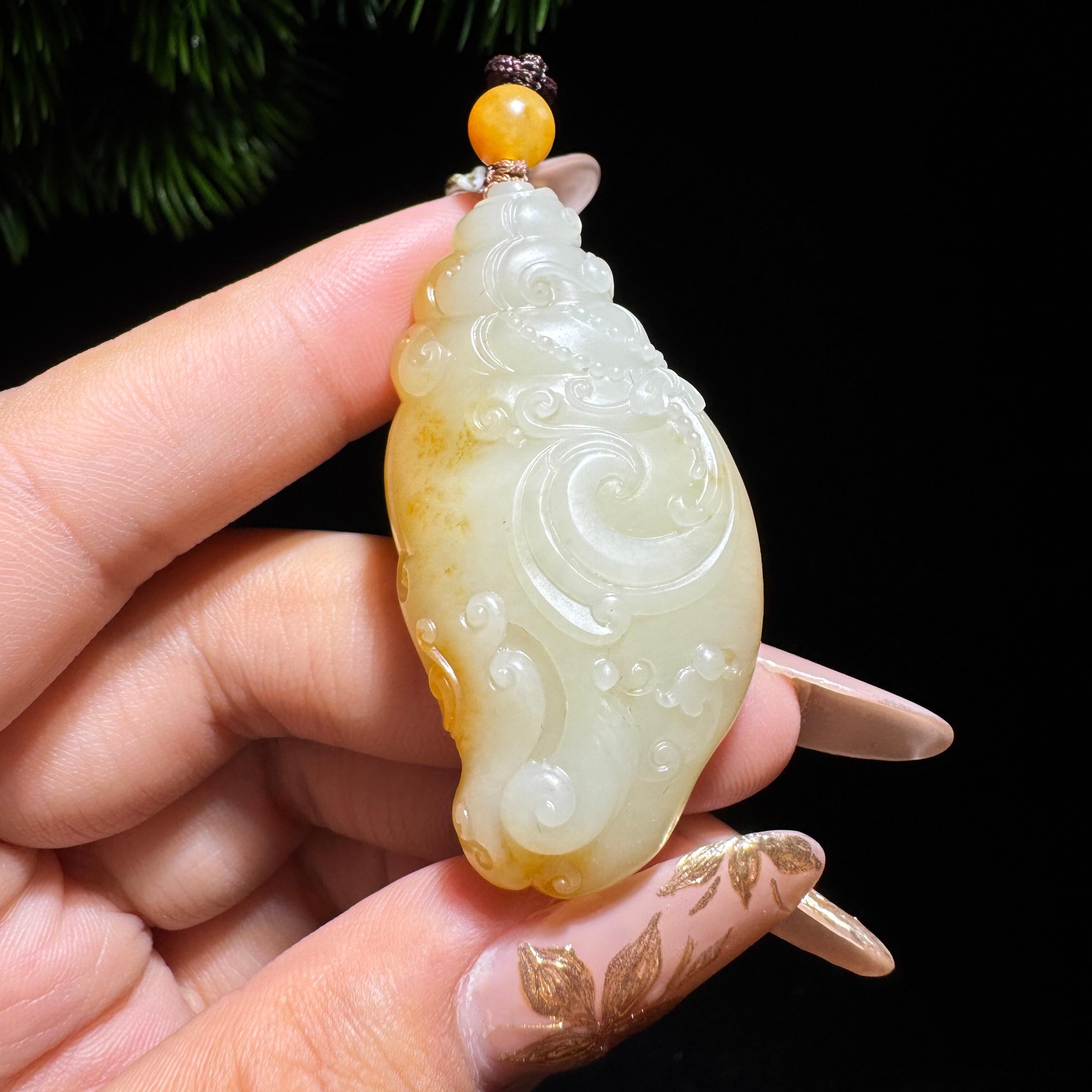和田玉籽料黄财神（26.5g）