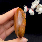 和田玉黄沁皮籽料【黄财神】手把件（176.9g）