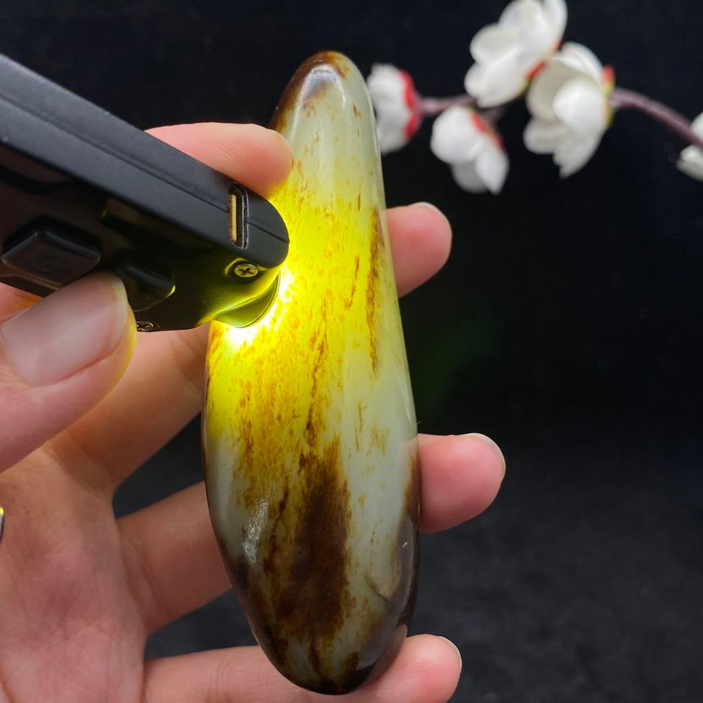和田玉聚黄皮籽料手把件（117.6g）